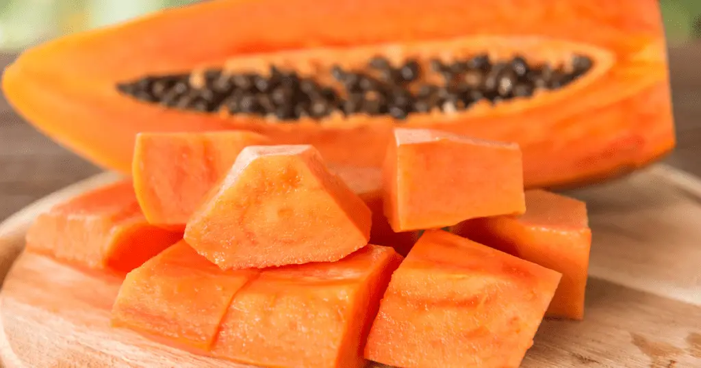 orange fruit black seeds